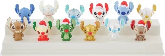Figura mistery bag enesco grand jester disney mini stitch navideño 1 unidad aleatoria